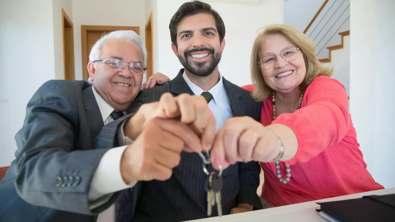 Family Signing Contract House Key Real Estate Agent