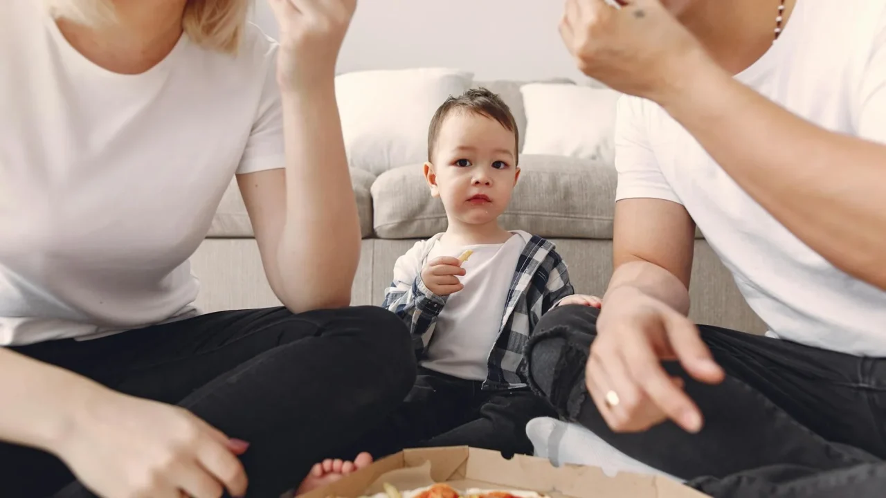 Happy Family Eating Together